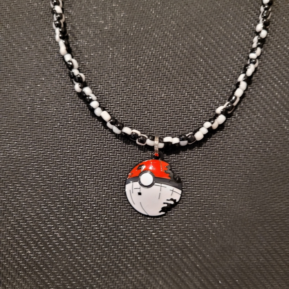 Red and Black Beaded Necklace with Poké Ball Pendant